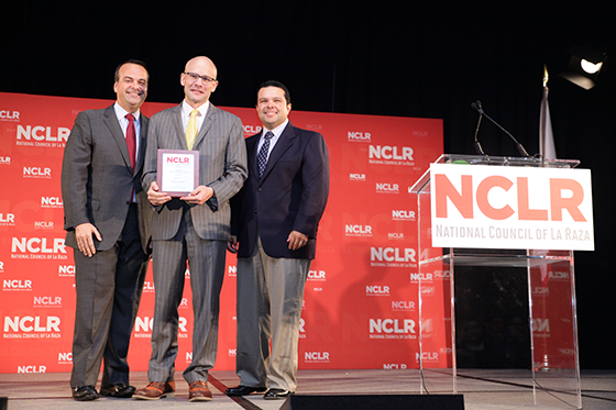Ayuda's Board Vice Chair, Mickey Martinez, accepting the Southeast Affiliate of the Year Award at the 2014 NCLR Annual Conference
