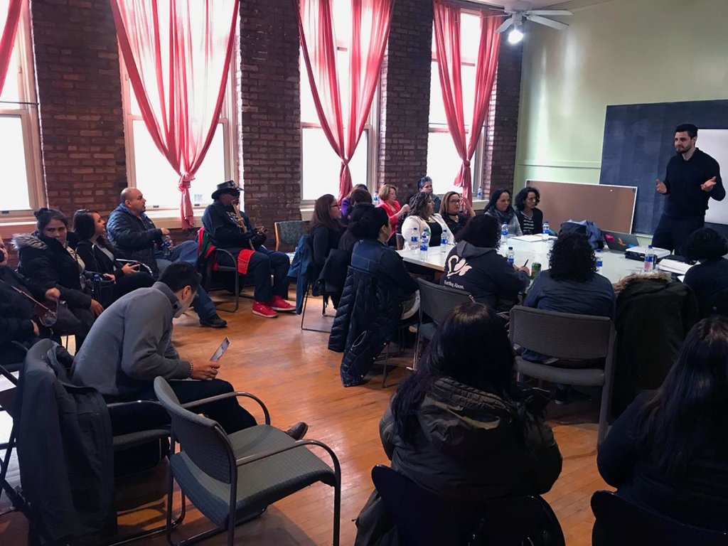 AHA-UnidosUS Alliance | Arturo Carrillo, manager of mental health and family support at the Community Wellness Program at Saint Anthony Hospital, addresses a convening of the Collaborative for Community Wellness in Chicago.